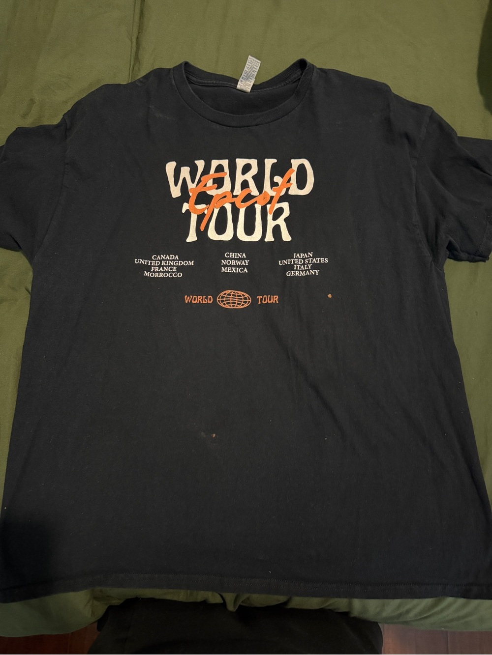 EPCOT World Tour Graphic Tee - Black with Orange & Cream Print